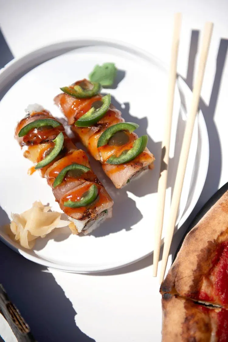 Specialty sushi rolls with jalapeño and spicy sauce at Pizzeria Maki, Wilmington DE